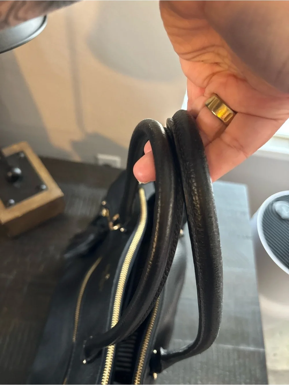 kate spade Black Pebbled Leather Tote with Tassel and Gold Hardware